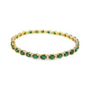 Brazalete en oro amarillo de 14K con diamantes de 0.31 ct y esmeralda de 10 ct