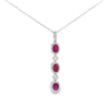Dije con Cadena en 14K en Oro Blanco con 0.47CT en Rubíes