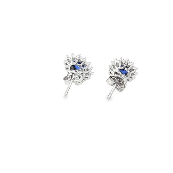 Aretes en oro blanco de 14K con 0.50 ct en diamantes y 1.84 ct en piedras centrales