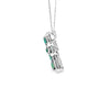 Cruz con cadena en oro blanco de 14K con 0.32 ct de diamantes y 1.1 ct en esmeraldas