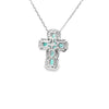 Cruz con cadena en oro blanco de 14K con 0.32 ct de diamantes y 1.1 ct en esmeraldas