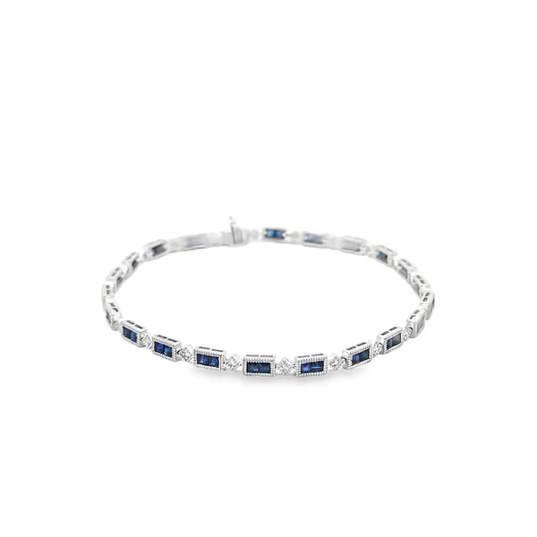 Brazalete en oro blanco de 14K con 2.31 ct en diamantes y zafiros