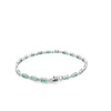 Brazalete en oro blanco de 14K con 1.80 ct de diamantes y esmeraldas