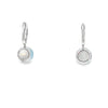 Aretes de oro blanco de 14K con diamantes de 0.07 ct, diseño delicado