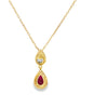 Dije con cadena en oro de 14K bicolor con diamante de 0.11 ct, rubí de 0.57 ct