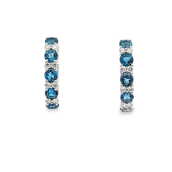 Aretes en oro blanco de 14K con diamante de 0.17CT y topacio London Blue de 1.26CT