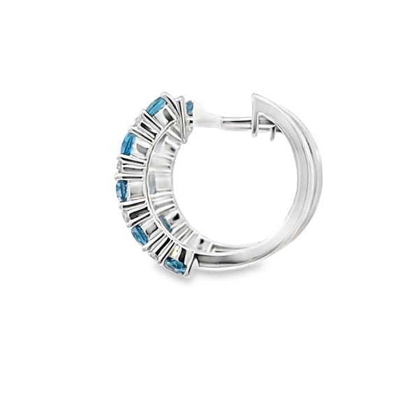 Aretes en oro blanco de 14K con diamante de 0.17CT y topacio London Blue de 1.26CT