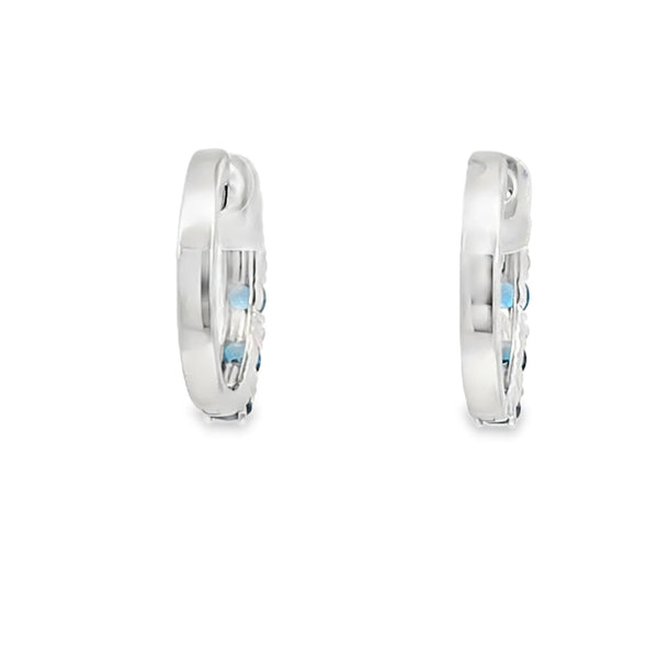 Aretes en oro blanco de 14K con diamante de 0.17CT y topacio London Blue de 1.26CT