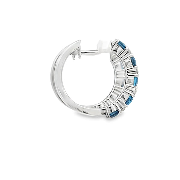 Aretes en oro blanco de 14K con diamante de 0.17CT y topacio London Blue de 1.26CT