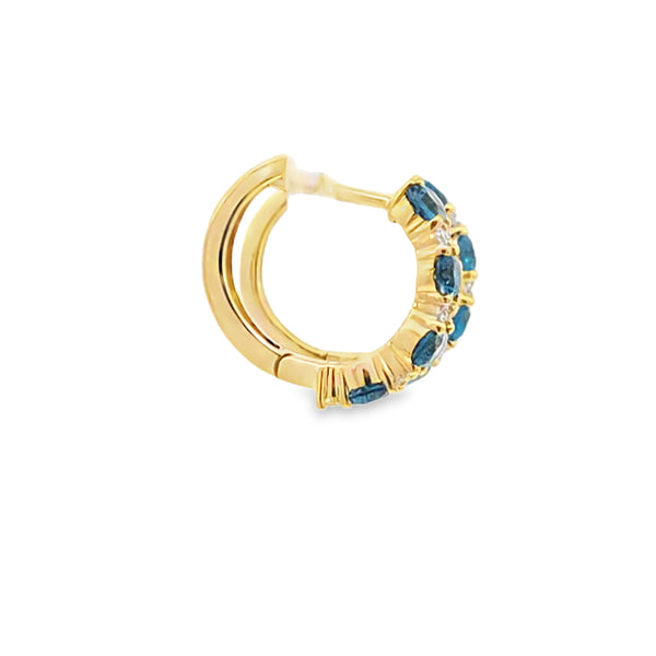 Aretes en oro amarillo de 14K con diamante de 0.16CT y topacio London Blue de 1.62CT