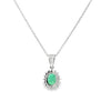Dije con cadena en oro blanco de 14K con diamante de 0.14CT y esmeralda de 0.62CT