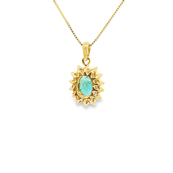 Dije con cadena en oro de 14K OA con diamante de 0.30 ct y esmeralda de 0.88 ct