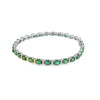 Brazalete en oro blanco de 14K con diamantes de 0.31 ct y esmeraldas de 10.01 ct