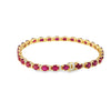Brazalete en oro amarillo de 14K con diamantes de 0.31 ct y rubís de 10 ct