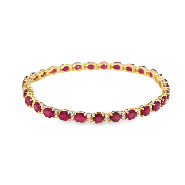 Brazalete en oro amarillo de 14K con diamantes de 0.31 ct y rubís de 10 ct