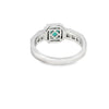 Anillo para dama en oro blanco de 14K con diamantes de 0.78 ct y esmeralda de 0.66 ct