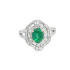 Anillo para dama en oro blanco de 14K con diamantes de 0.97 ct y esmeralda de 1.24 ct