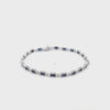 Brazalete en oro blanco de 14K con 2.31 ct en diamantes y zafiros