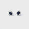 Aretes en oro blanco de 14K con 0.50 ct en diamantes y 1.84 ct en piedras centrales