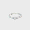 Anillo solitario en oro blanco de 14K con un diamante de 0.15 ct
