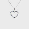 Dije con cadena en oro blanco de 14K con zafiro corazón de 0.13 ct