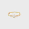Anillo solitario en oro amarillo de 14K con un diamante de 0.15 ct