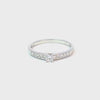 Anillo solitario en oro blanco de 14K con un diamante de 0.30 ct
