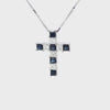 Cruz con cadena en oro blanco de 14K y zafiro de 0.27 ct